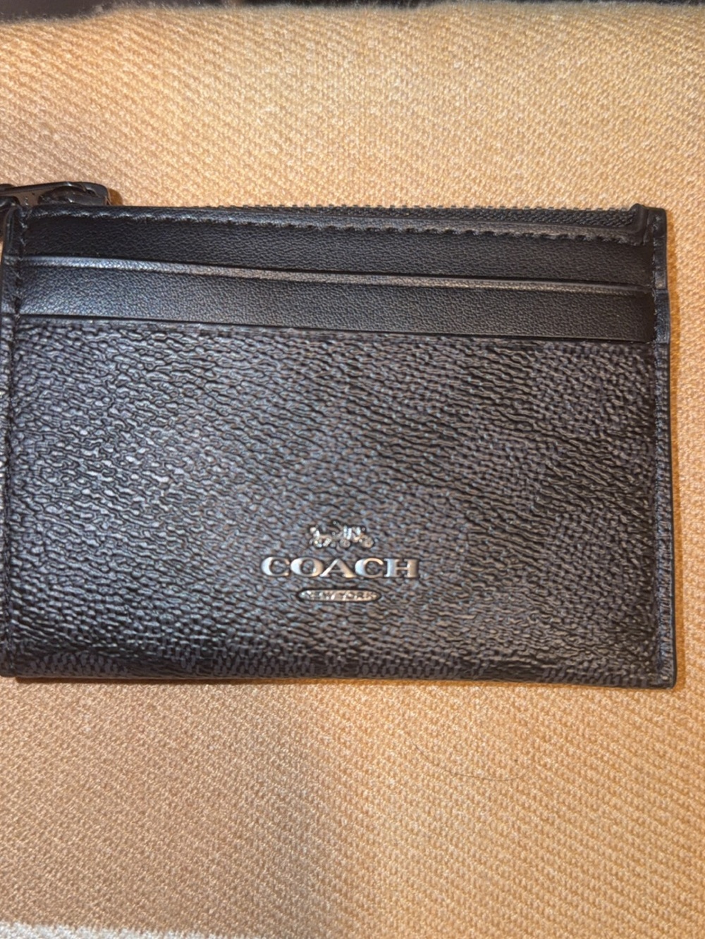 Coach Black Pebbled Leather Card Holder with Silver Logo ID holder.